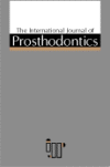 Int J Prosthod